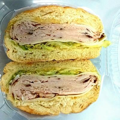 Jerk Turkey with Swiss, lettuce and honey mustard.