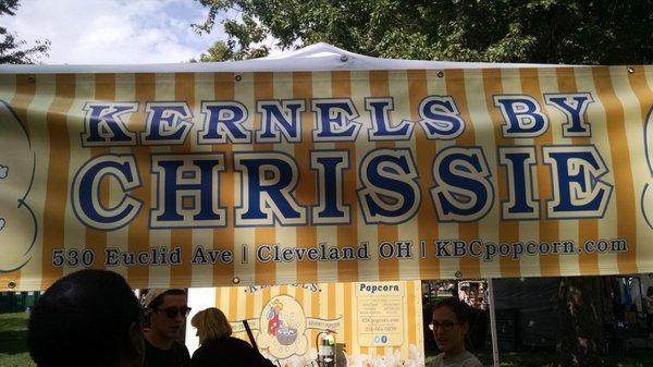 One of the food vendors selling cinnamon and plain kettlecorn.