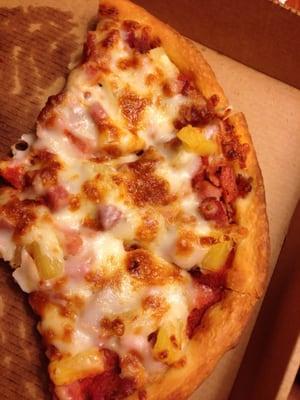 Wonderful ham, bacon and pineapple pizza.