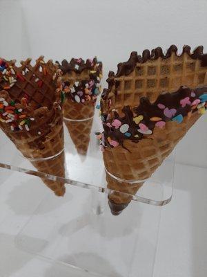 waffle cones dipped in chocolate with sprinkles