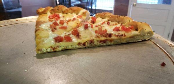 Chicken Bacon Ranch and Tomato stuffed pizza.