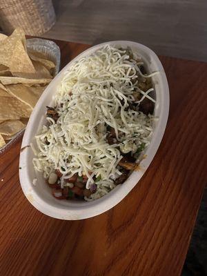 My husbands burrito bowl. Full to the top.