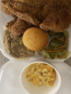 Fried pork chop dinner cabbage, dressing and Mac and cheese