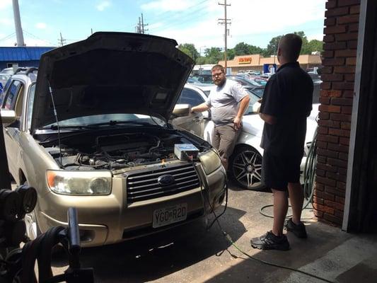 a car being worked on by the fabulous Ecomen