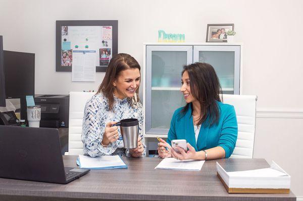 Lisa and Isabel working in Lisa's office