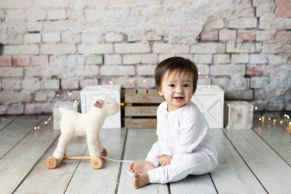 Baby's first year photographs at the Lovely Baby Photography studio in Carlsbad.