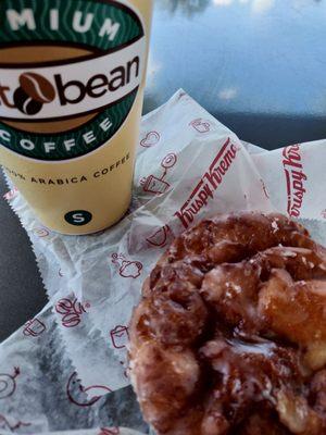 Coffee and Krispy Kreme Apple Fritter.