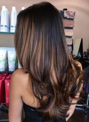 Black hair with caramel brown balayage