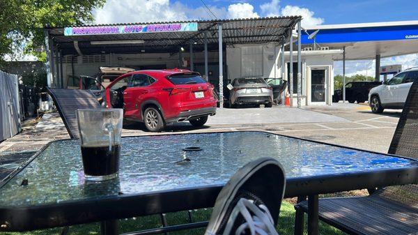 Chilling 305 style with black coffee (95deg outside) waiting on my car.