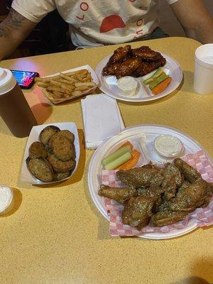 Lemon pepper wings, fired zucchini, Cajun fries, honey barbecue wings