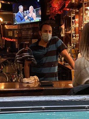 Bartender was rude and wouldnt serve patrons wearing a mask and following all guidelines.