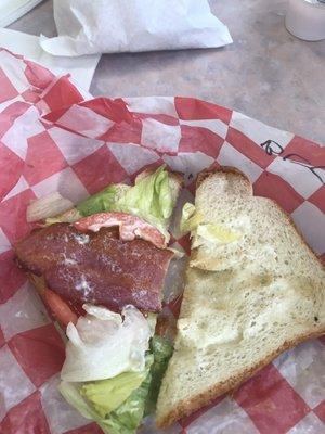 BLT with one slice of bacon and one slice of tomato