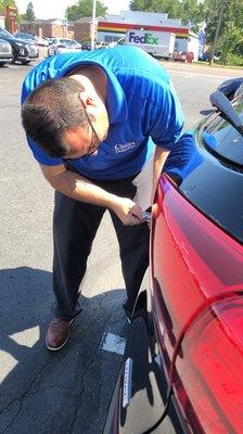 Dan attaching my license plate