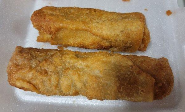 Chicken egg roll on top, pork & shrimp egg roll on the bottom