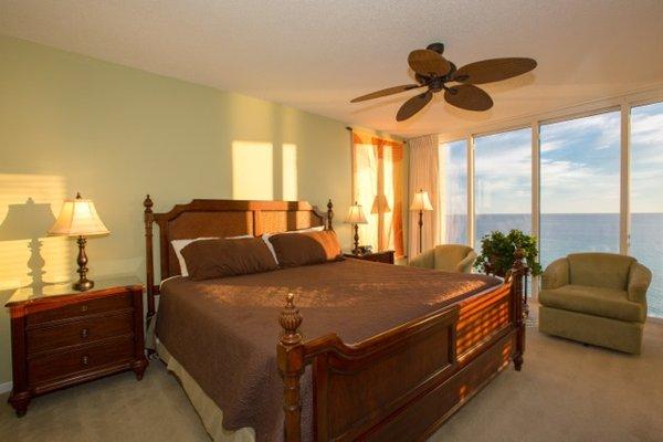 Large king size bed with beautiful Gulf Views at Long Beach Resort in Panama City Beach, Florida.