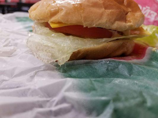 New California Burger, way off from the picture, filling for the time and wow, is that a different sized Patty too; what's really going on