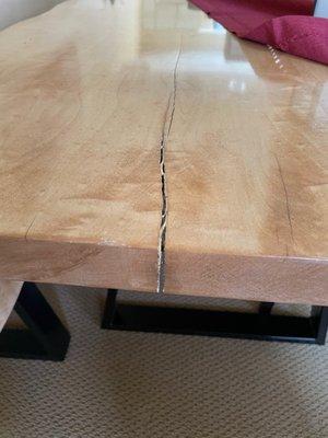 Original table: cracking and splitting across top and under through to bottom