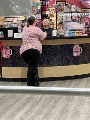 It's the lady in pink btw