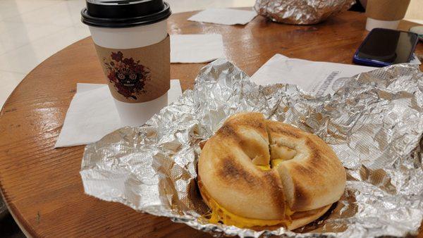 Medium Coffee w/Almond Milk & Ralph Wilson w/bacon on a plain bagel: A great way to start the work day!