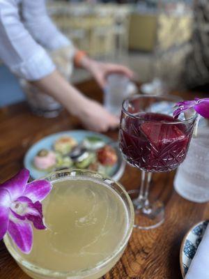 THYME TO BLOOM cocktail: Fig Infused Vodka, Prosecco, Honey-Thyme Syrup, Lemon. RED SANGRIA: Vodka, Rum, Wine, Triple Sec, OJ & Grapefruit