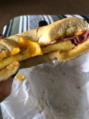 Pastrami bagel that looks worse than a McDonald's sausage egg and cheese muffin