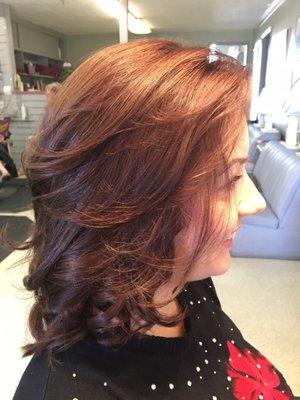 Get in to autumn season with nice rich auburn color hair style.