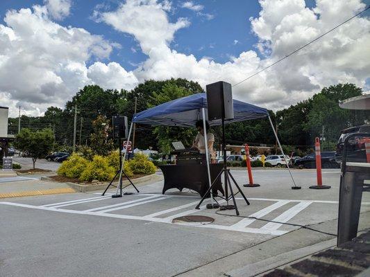 DJ outside Buteco on Sunday afternoon, June 27, 2021.