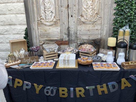 The outdoor background is beautiful and made our dessert table even more special