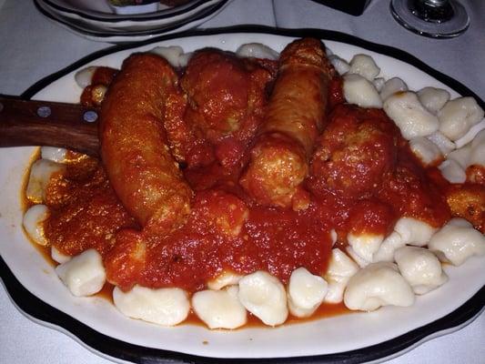 Homemade gnocchi with meatballs and Italian sausage