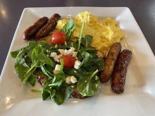 Avocado toast, with eggs and sausage