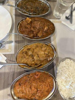 Sag Lamb, Lamb vindaloo, Beef Korma, and Murg Makhani (butter chicken) ...top to bottom