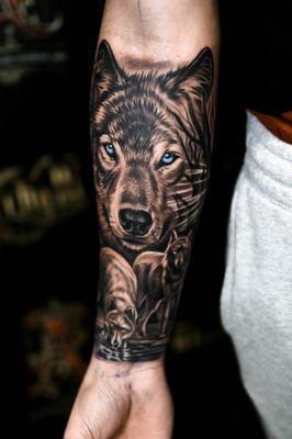 Wolf pack for a family tribute by master tattoo artist @aleman_art.