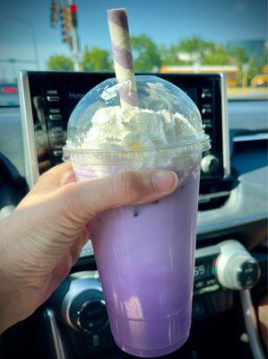 Ube Horchata - sweet, creamy and vibrant refreshing drink. Topped with whipped cream and an ube wafer.