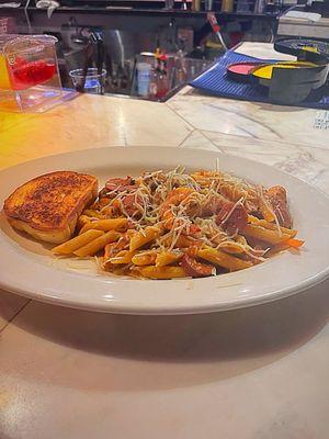 Jambalaya Pasta: Shrimp, Chicken, Smoked Beef Sausage, Onions Tomatoes & Mushrooms