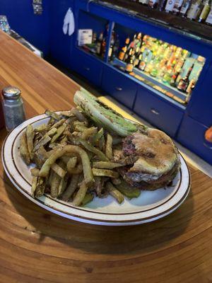 Undercooked burger and greasy fries