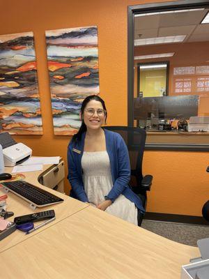 Dennise keeps the front office humming, where clients feel free to get helpful answers.