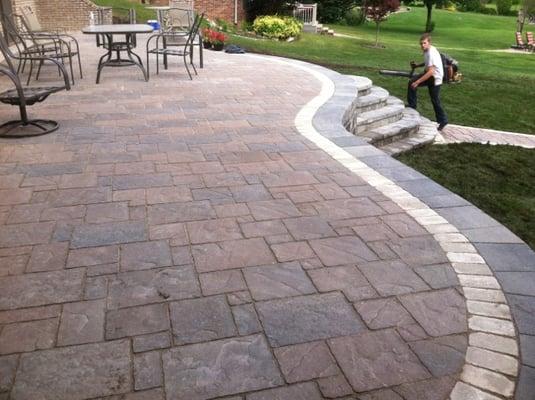 Loon Lake raised patio with sidewalk and lower patio at waters edge