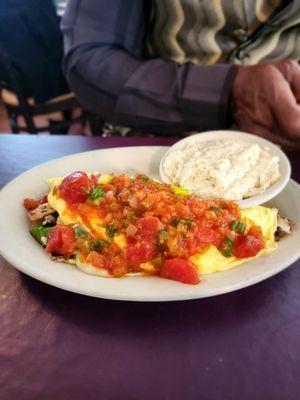 Shrimp Omelet with grits (homemade salsa on top)