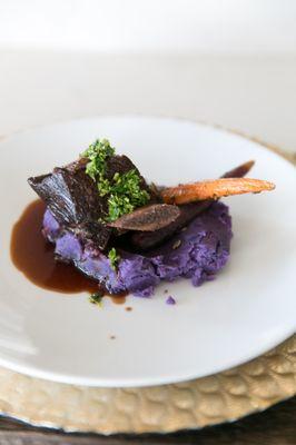 Plated entree, Braised Short Ribs over Okinawan Sweet Purple Potatoes