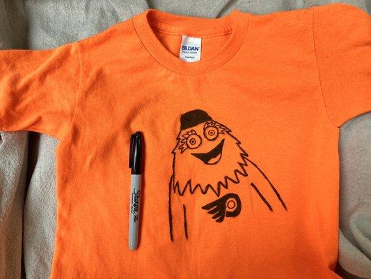 Dollar Tree, Glassboro -- kids' tee and Sharpie from DT = $2 DIY tee! Pre-wash, draw, throw in dryer to set.