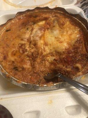 Supposed to be lasagna but really not. Greasy, lots of cheese, some meat sauce and no lasagna noodles