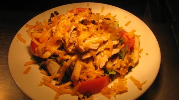 Grilled Chicken with french fries, tomatoes, onions and tons of Cheddar Cheese....YUM!!