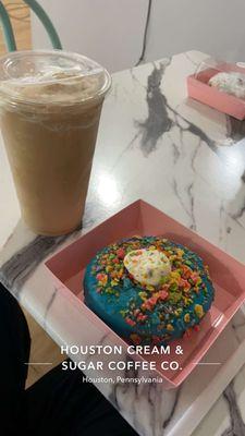 A frozen oatmilk sf caramel latte and a raspberry fruity pebbles donut. Yummy!!