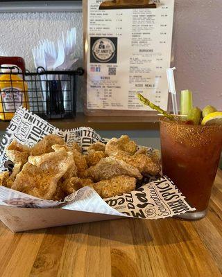 Cracklings and a bloody mary