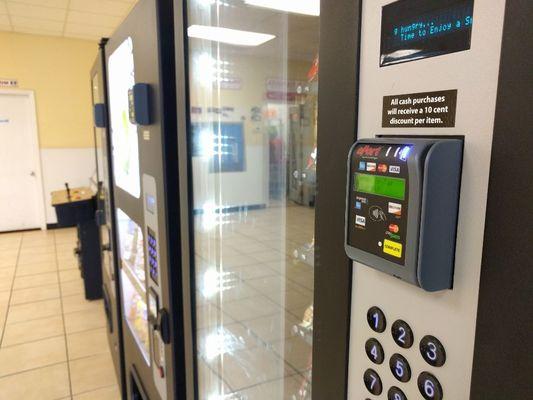 All vending machines (if fact, the whole laundromat) takes credit cards, Apple Pay and Android Pay.