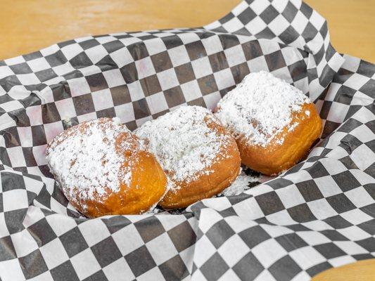 Beignets are a delicious fried pastry topped with powered sugar