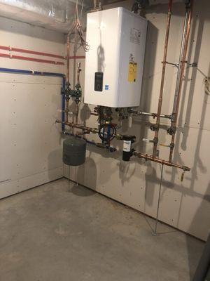 NAVIEN High efficiency water heater boiler combo.