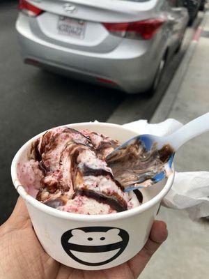 Red velvet cake ice cream with chocolate drizzle and color-changing spoon from Snow Monster