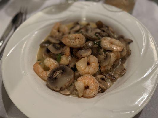 Shrimp Diane- Sautéed gulf shrimp with green onions & mushrooms. Served in a butter sauce, over baked rice.