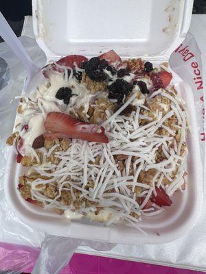 Bionicos has strawberries, bananas, raisins, cantaloupe, apples, coconut, granola, & sweet cream!